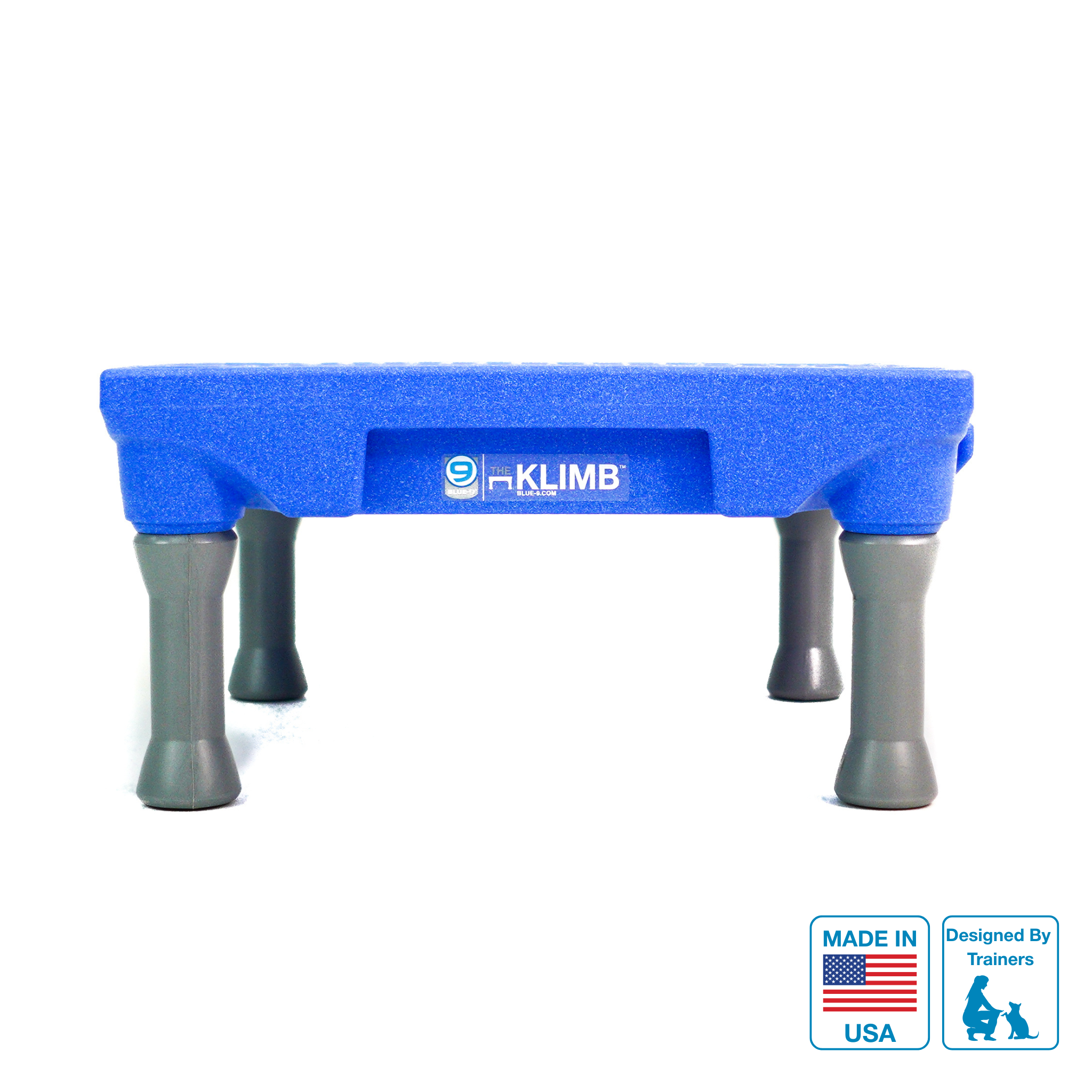 Blue KLIMB Dog training platform with grey legs on a white background with a Made in USA badge and Designed by Trainers Badge