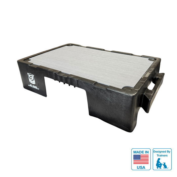 Black KLIMB Jr Dog training platform with a white background. Label that says MADE IN USA and a label that says Designed by Trainers