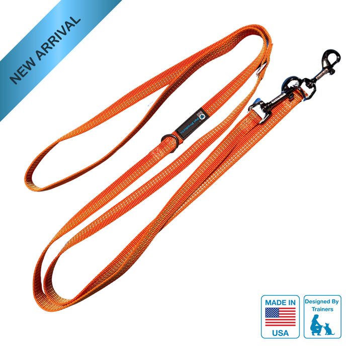 Reflective Orange dog leash with a clip on a white background, featuring 'Made in USA' and 'Designed by Trainers' logos.