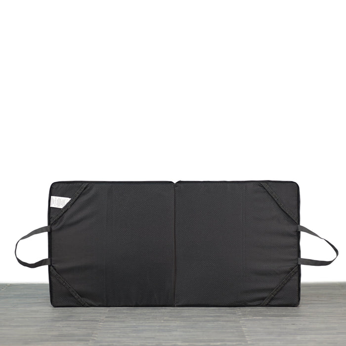 Underside of restore double dog bed displayed on a white background. attachment straps and handles are visible.